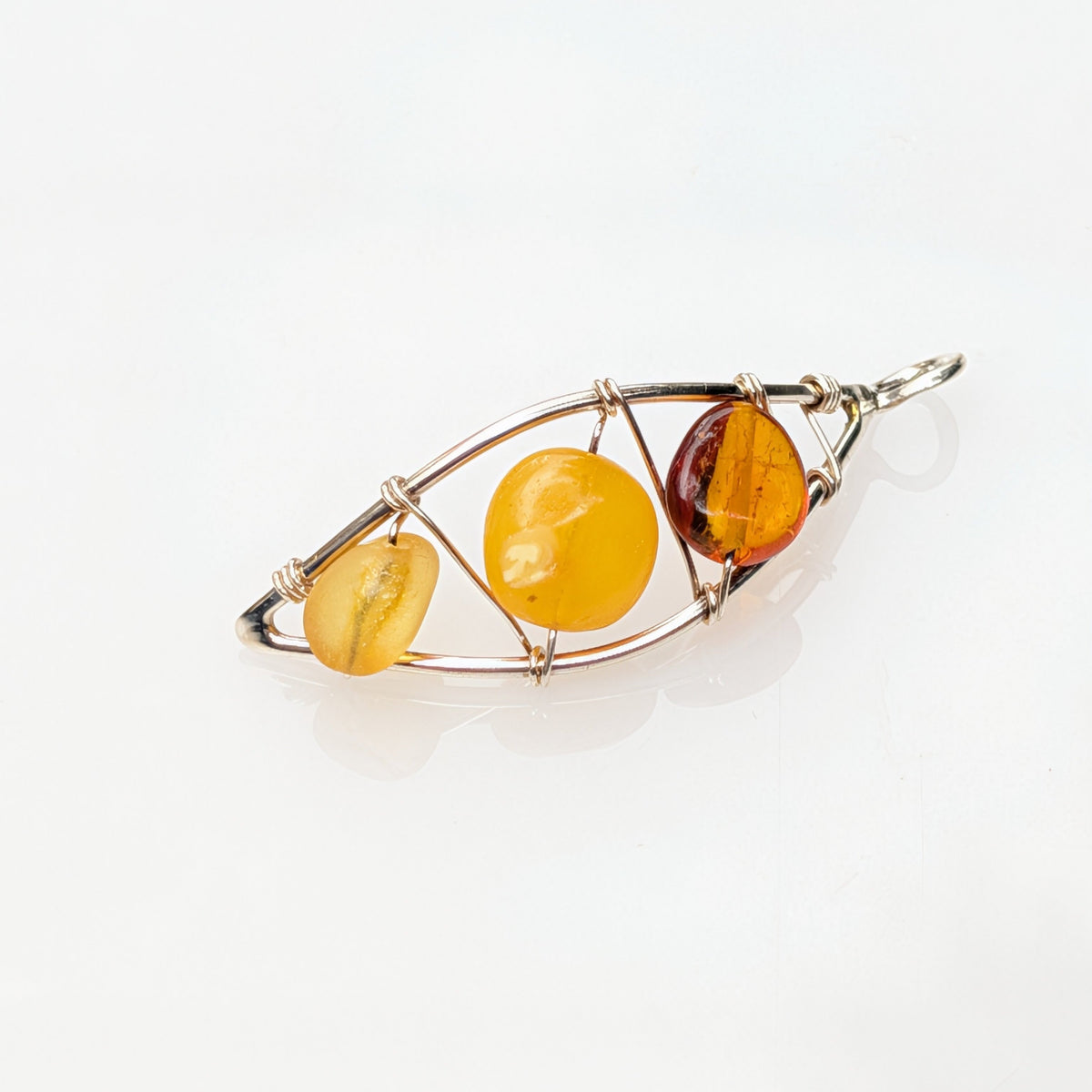 Heliad Pendant — Baltic Amber & Sterling Silver