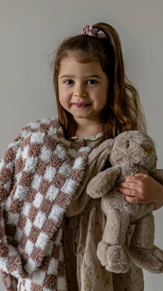 Couverture pour tout-petit à carreaux blancs et couleur chocolat