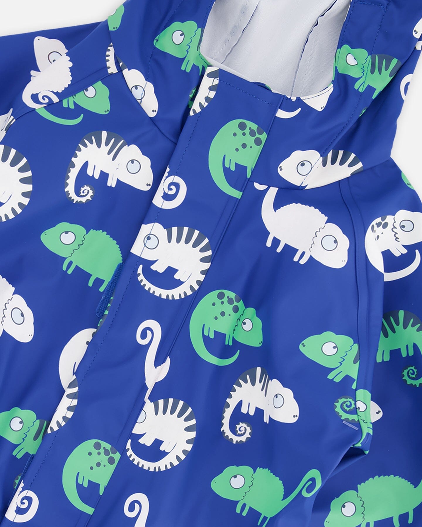 Blue rain jumpsuit with color-changing chameleon print