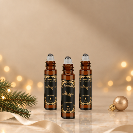 Emuracle Stocking Stuffer 3-Pack: three 10 ml emu oil roll-ons in a holiday setting